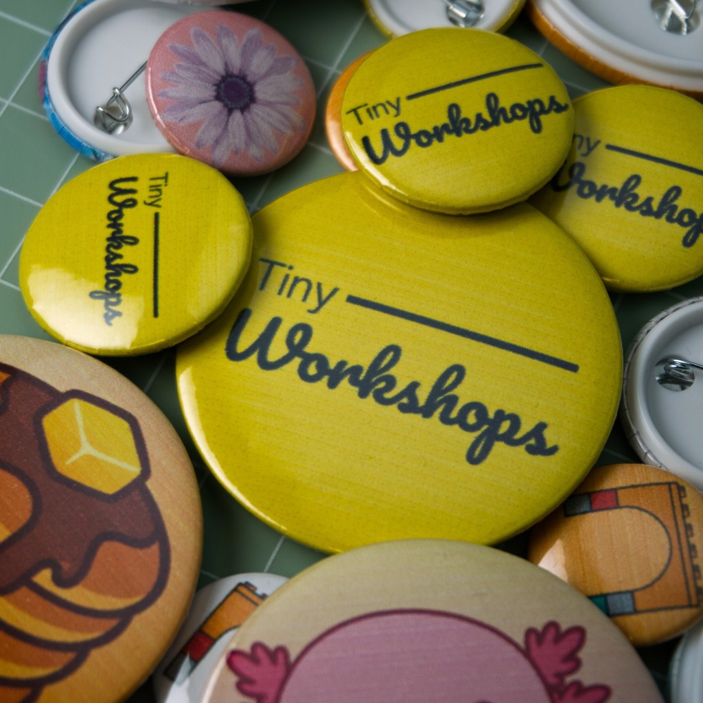 Tiny Workshops buttons on table 4 sq